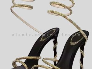 black stilettos with ankle wrap gold strap vendor